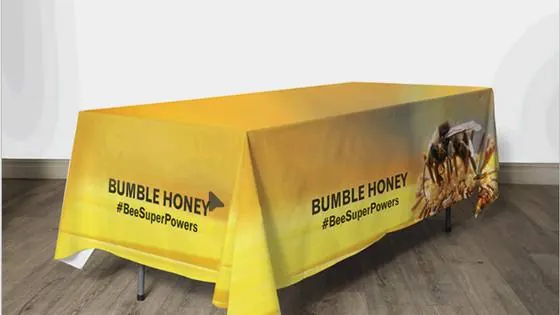 Digitally printed branded table cloth on a trestle table