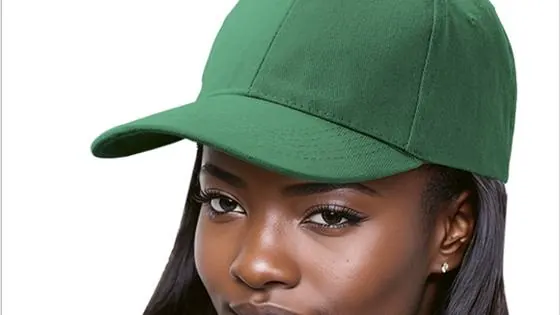 Six-panel brushed cotton cap in green, worn by a model