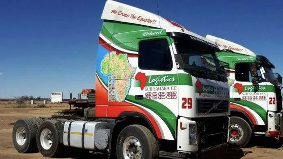 Two Volvo truck cabs in full printed vinyl livery for a logistics fleet